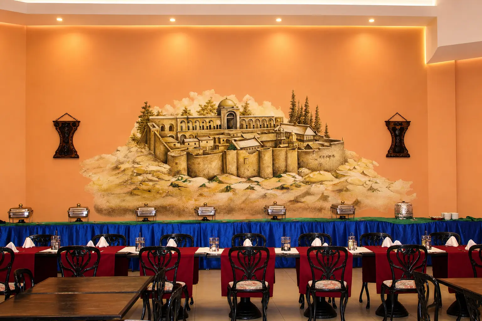 Buffet hall with a hand-painted mural of Saint Catherine's Monastery