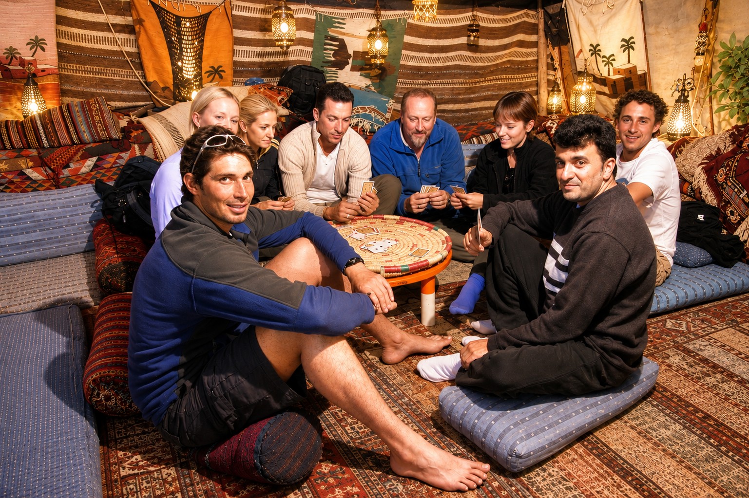 Guests gathering around a table for a group evening